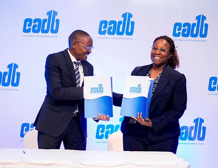 Ag Director General Benard P. Mono with the Azania Bank Managing Director Esther G. Mang’enya